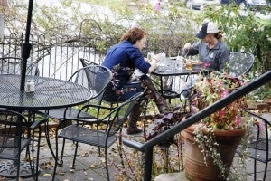 The outdoor patio at Proper overlooks downtown Boone. Photo by Ken Ketchie, High Country Press.
