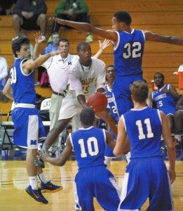 North's  Taheem Mungin #15 shoots underhanded again the Mooresville team.  photo by Wayne Hinshaw, for the Salisbury Post