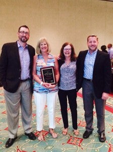 Left to right: NCMGMA President Jacob Rodman, 2015 Administrator of the Year Sandra Jarrett, NCMGMA Governance Committee Chair Laura Sanborn and Steve Parker of Medical Mutual