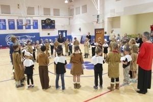 Submitted photo The Pilgrims and Native Americans of Salisbury Academy’s first and third grades join together for a Thanksgiving blessing.