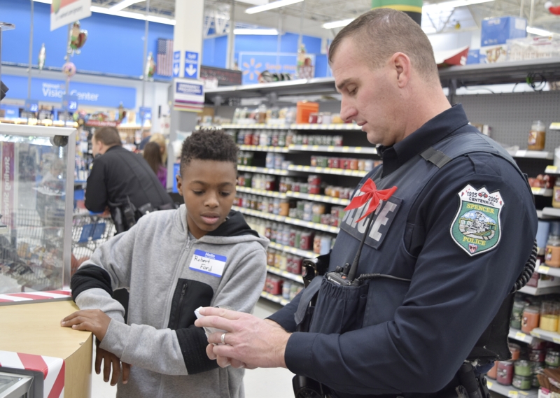 Shop with a Cop Local law enforcement officers visit Walmart with