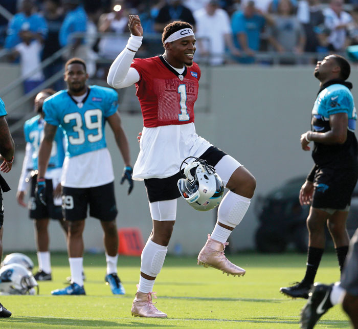 Cam Newton shakes off rust, returns to practice