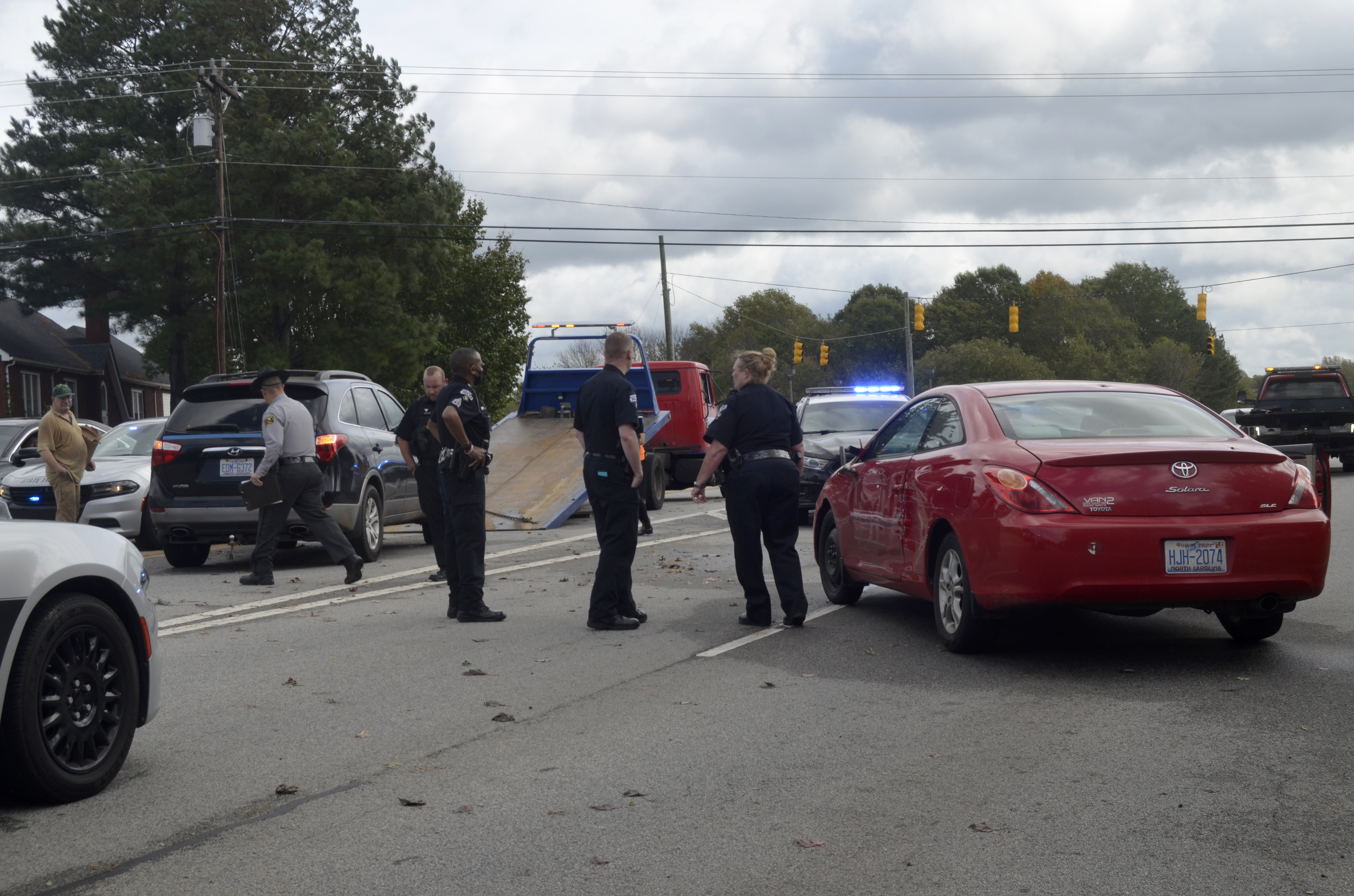 UPDATED Three charged in connection with driveby shooting, vehicle