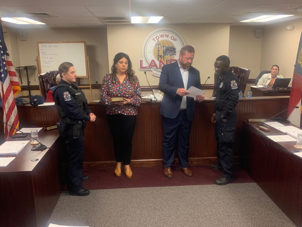 Joining the ranks Landis swears in two police officers Salisbury Post Salisbury Post