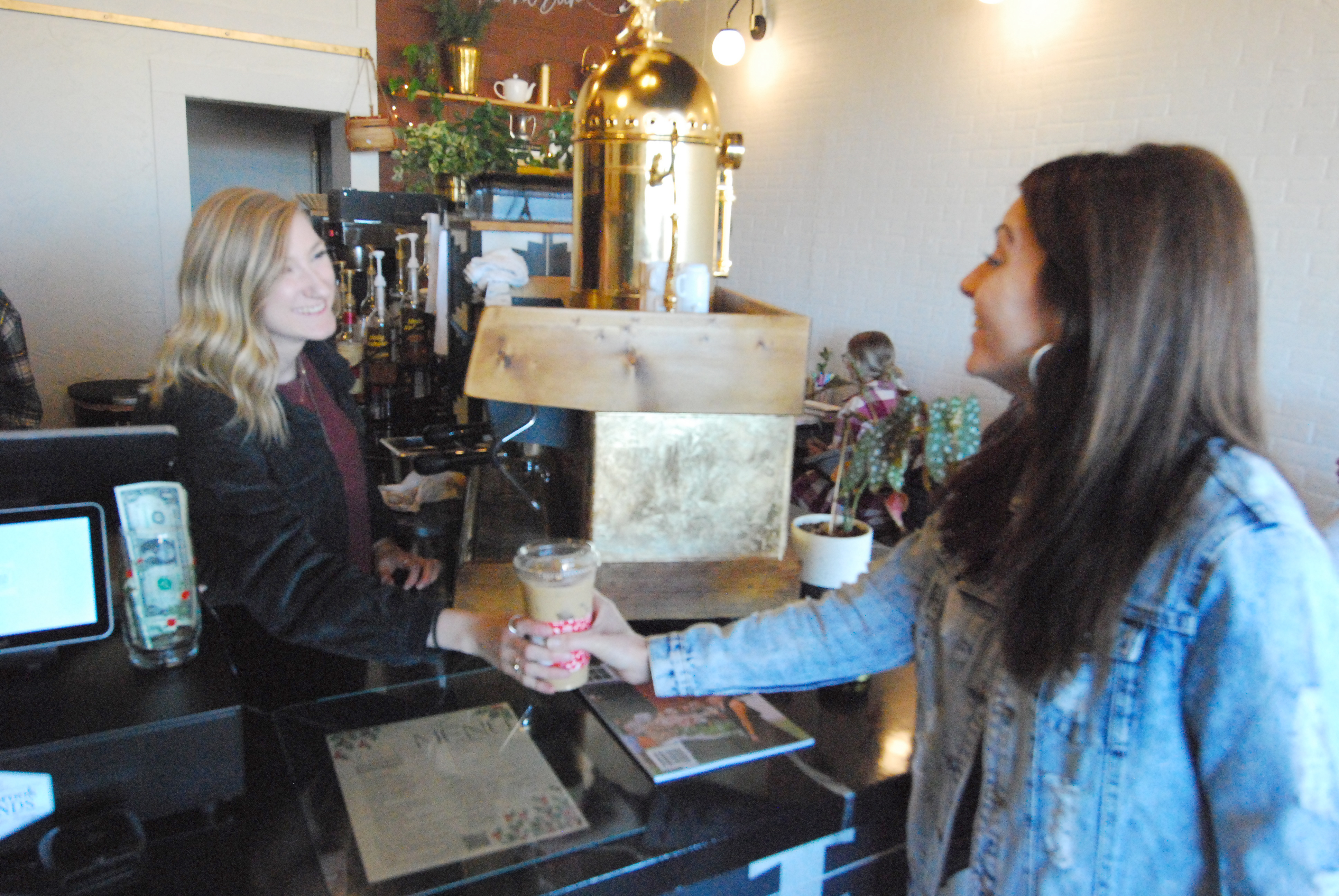 The place to be Landis coffee shop offers community table Salisbury