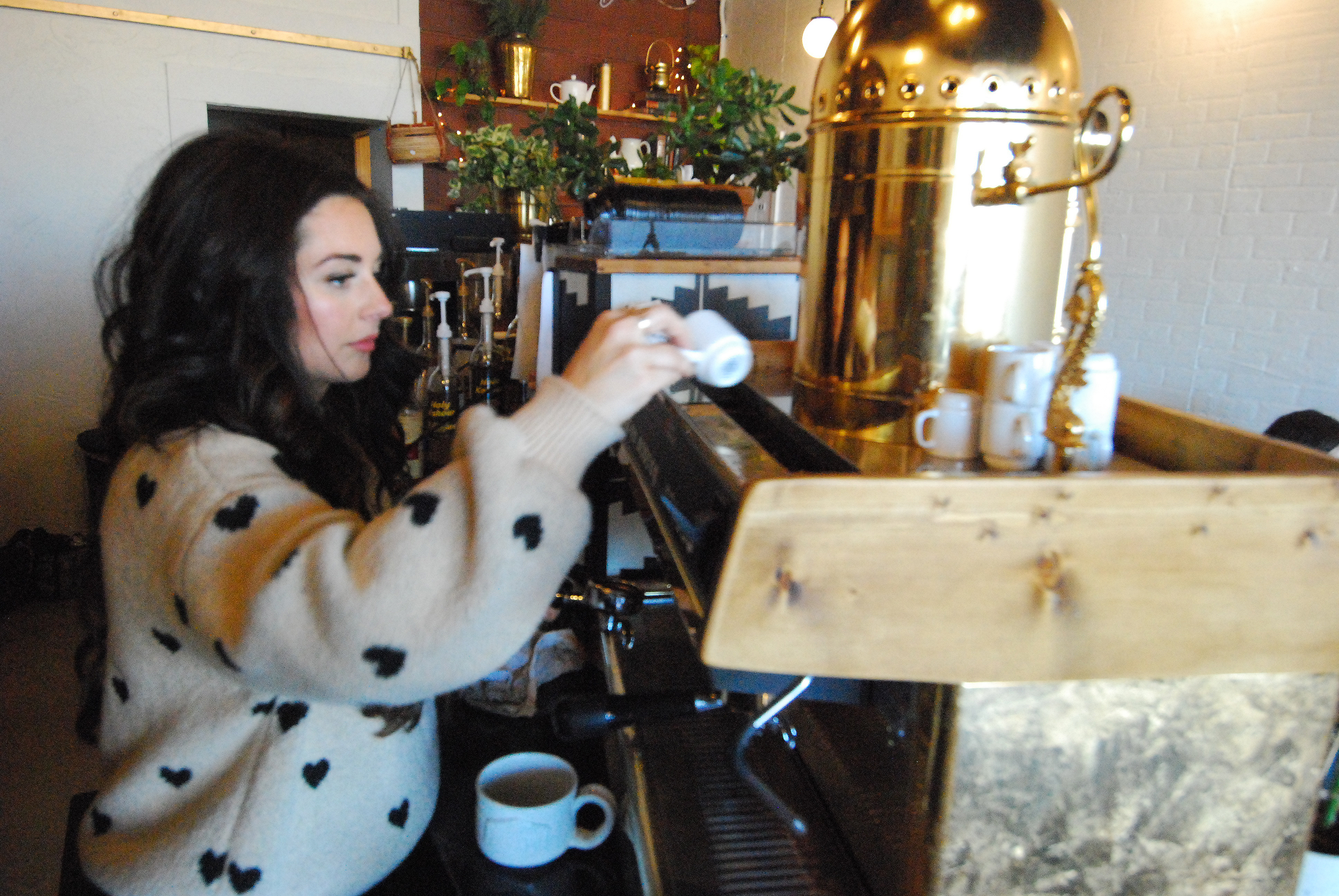 The place to be Landis coffee shop offers community table Salisbury