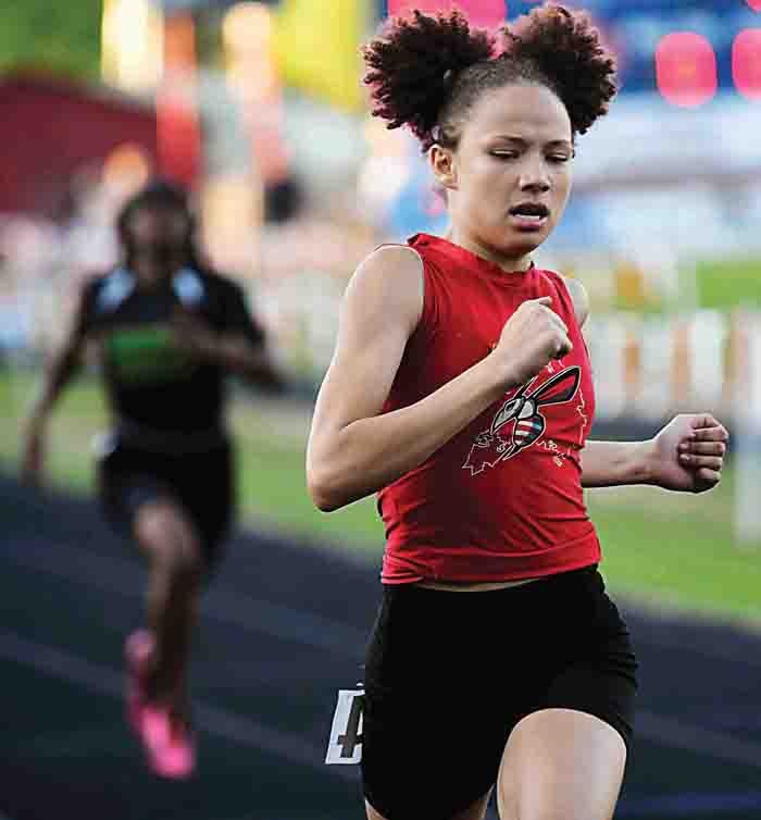 High school girls indoor track: Golden girl Lewis repeats