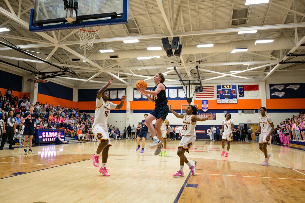 High school boys basketball: Carson advances in thriller